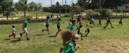 Sports Coaching volunteers play sports games with children in Belize Projects Abroad Sports Coaching volunteers play sports games with children in Belize